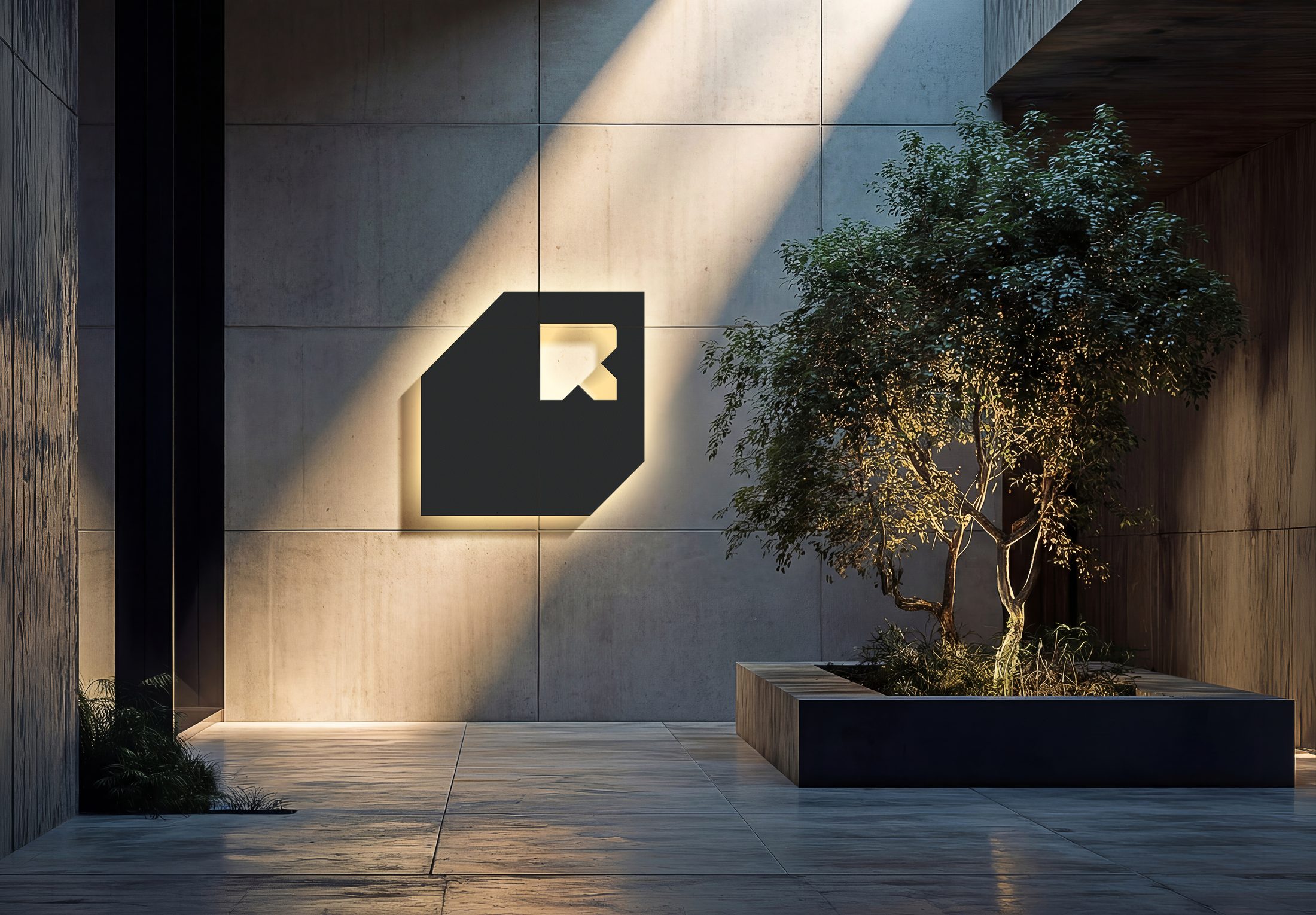 Roydon MEP — exterior courtyard signage at golden hour