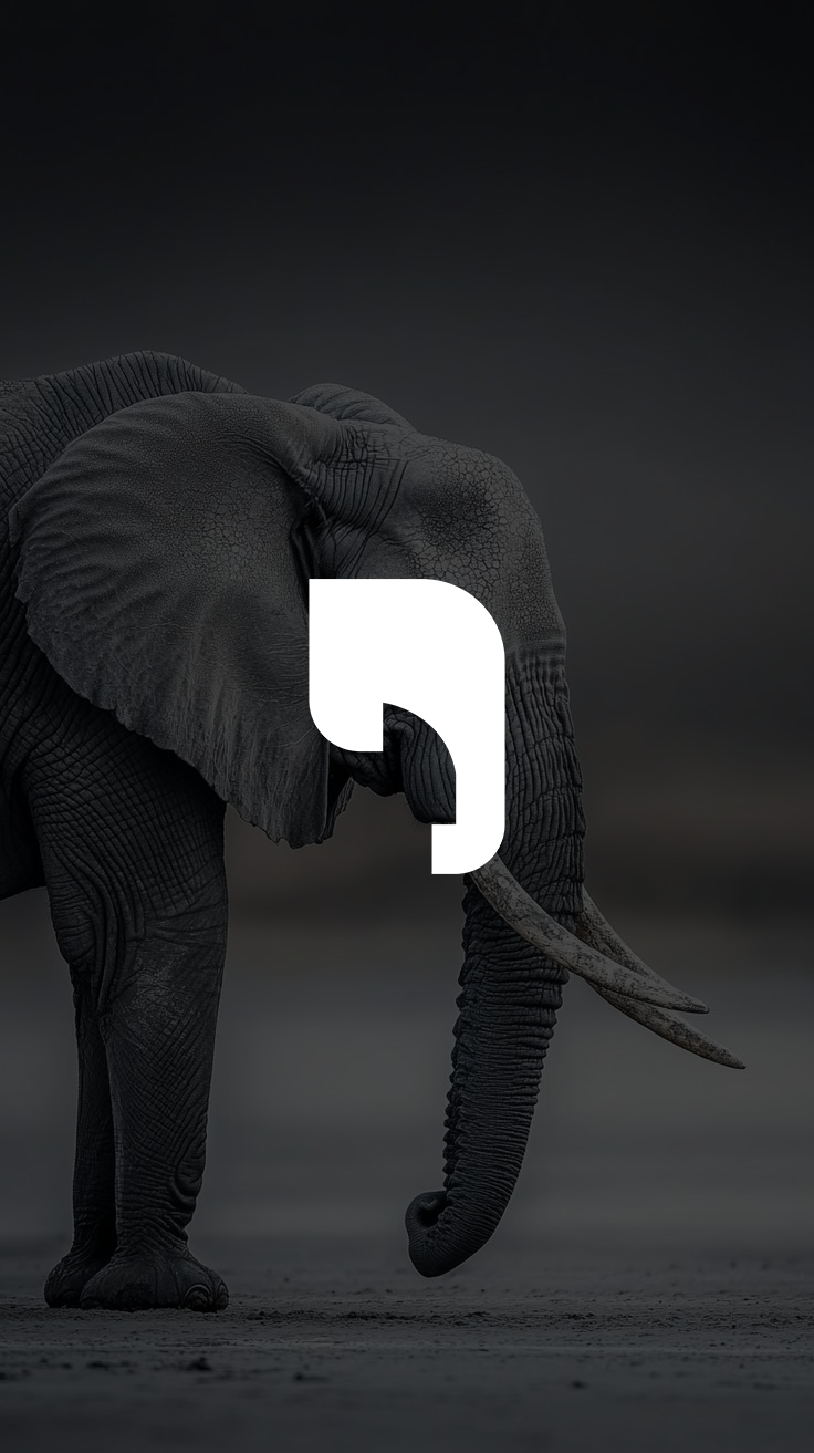 The Quiet Giant — elephant with the R mark carved in negative space